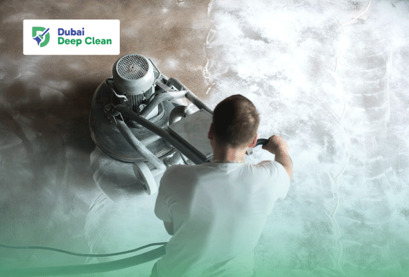 An overhead view of a cleaning specialist operating a heavy-duty floor polishing machine with white buffing foam on a large surface area.
